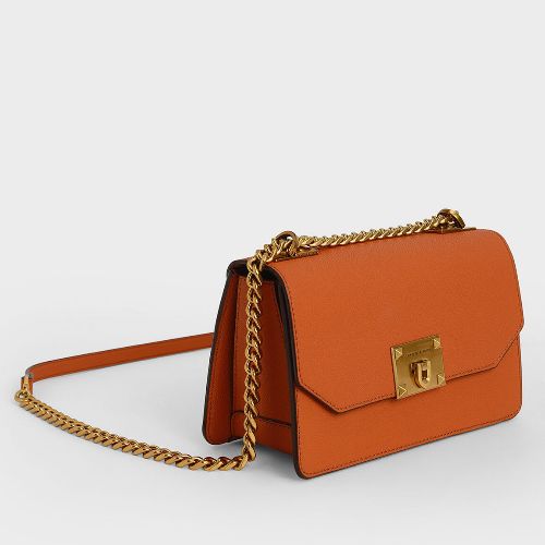 Metal push lock hot sale crossbody bag